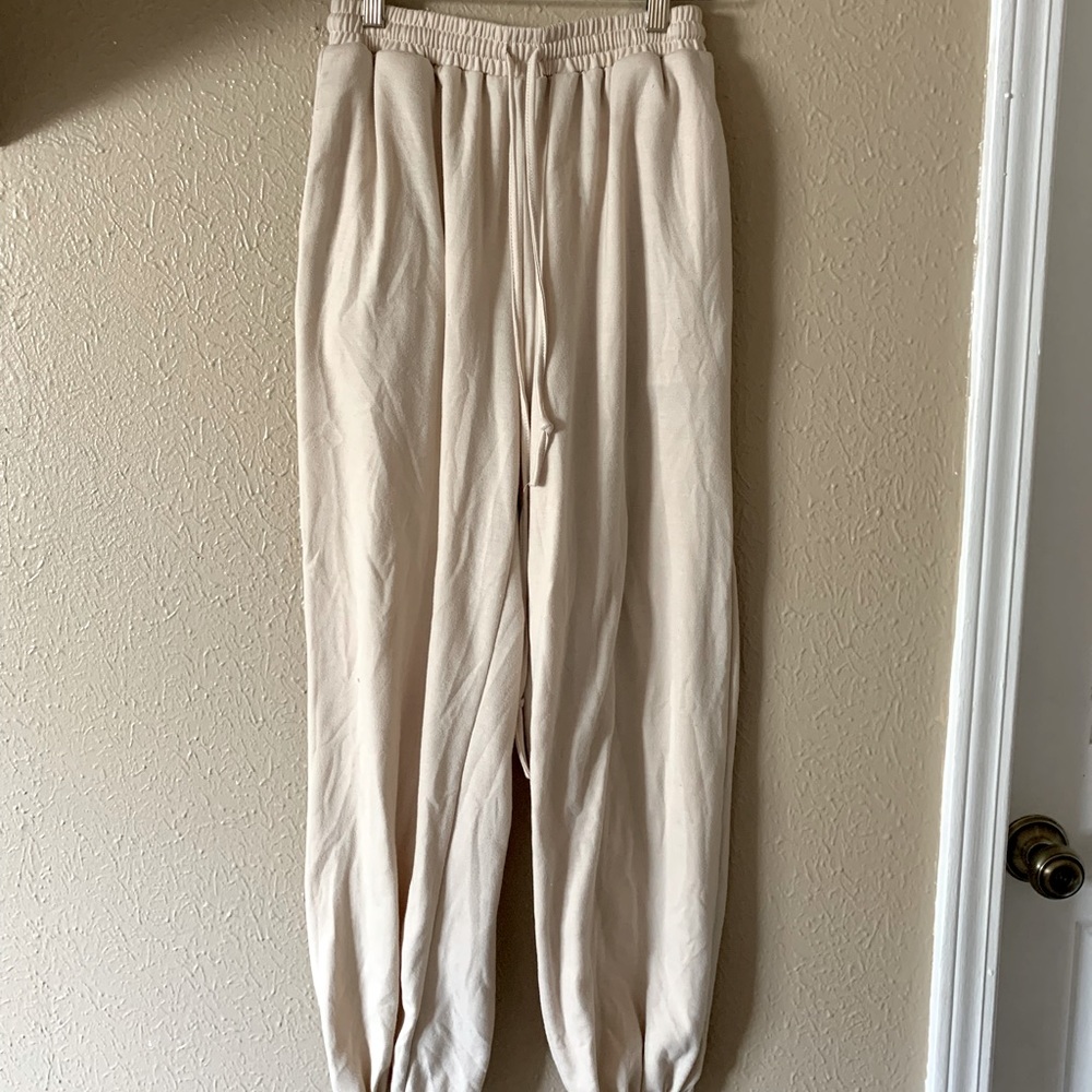 Cream sweatpants